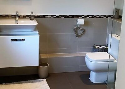 Ms Abbot: New bathroom suite and tiling